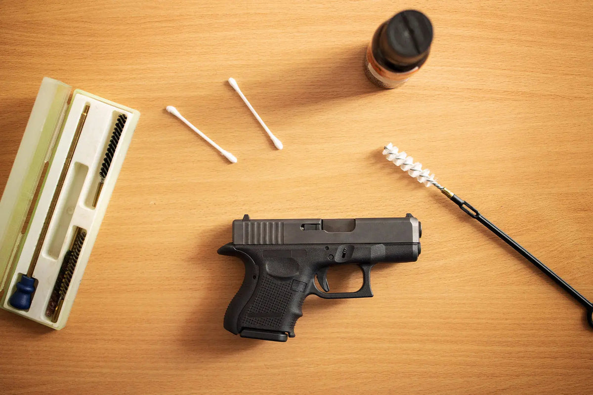 Modern firearm cleaning kit accessories and maintenance tools