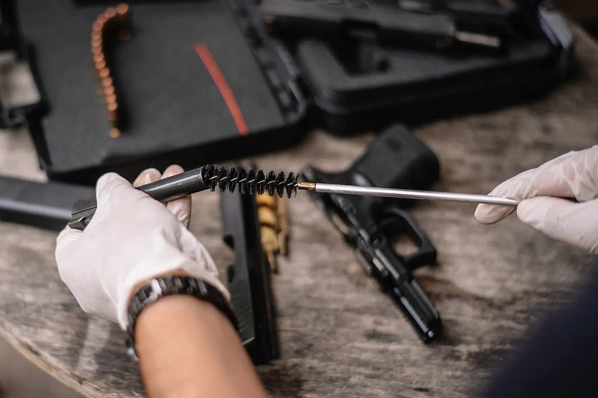 Gun cleaning kit with essential firearm maintenance tools