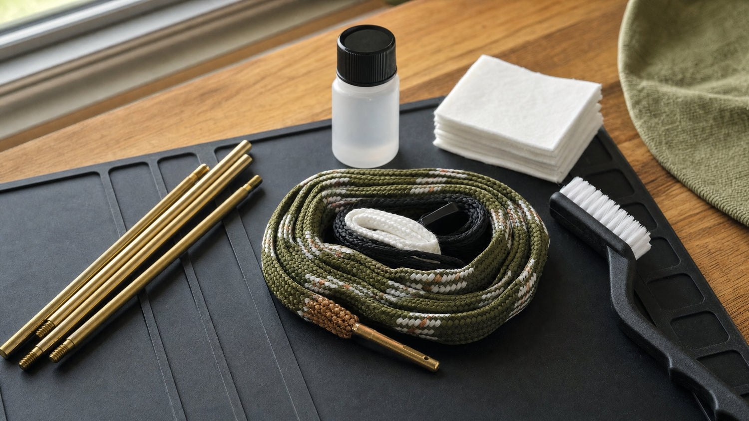 Pull-through cord on bench for bore snake gun cleaning