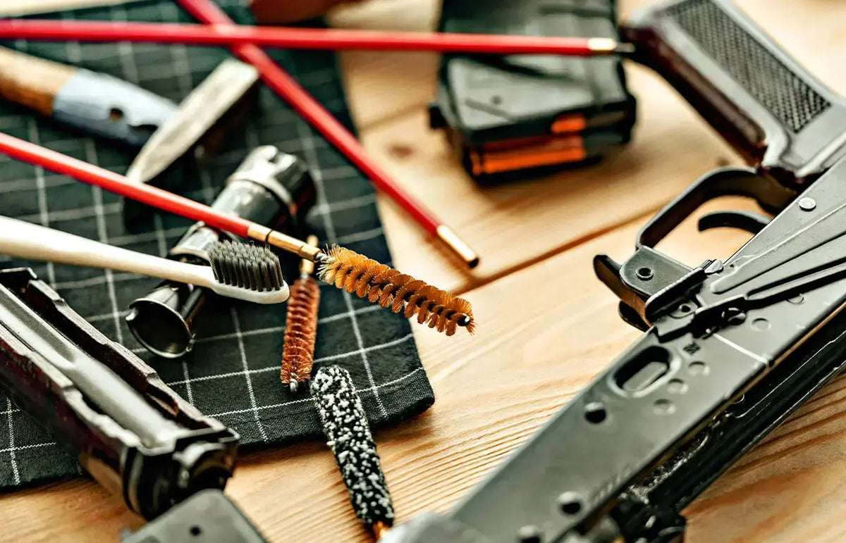 AR-15 upgrade and maintenance tools on a gunsmith workbench