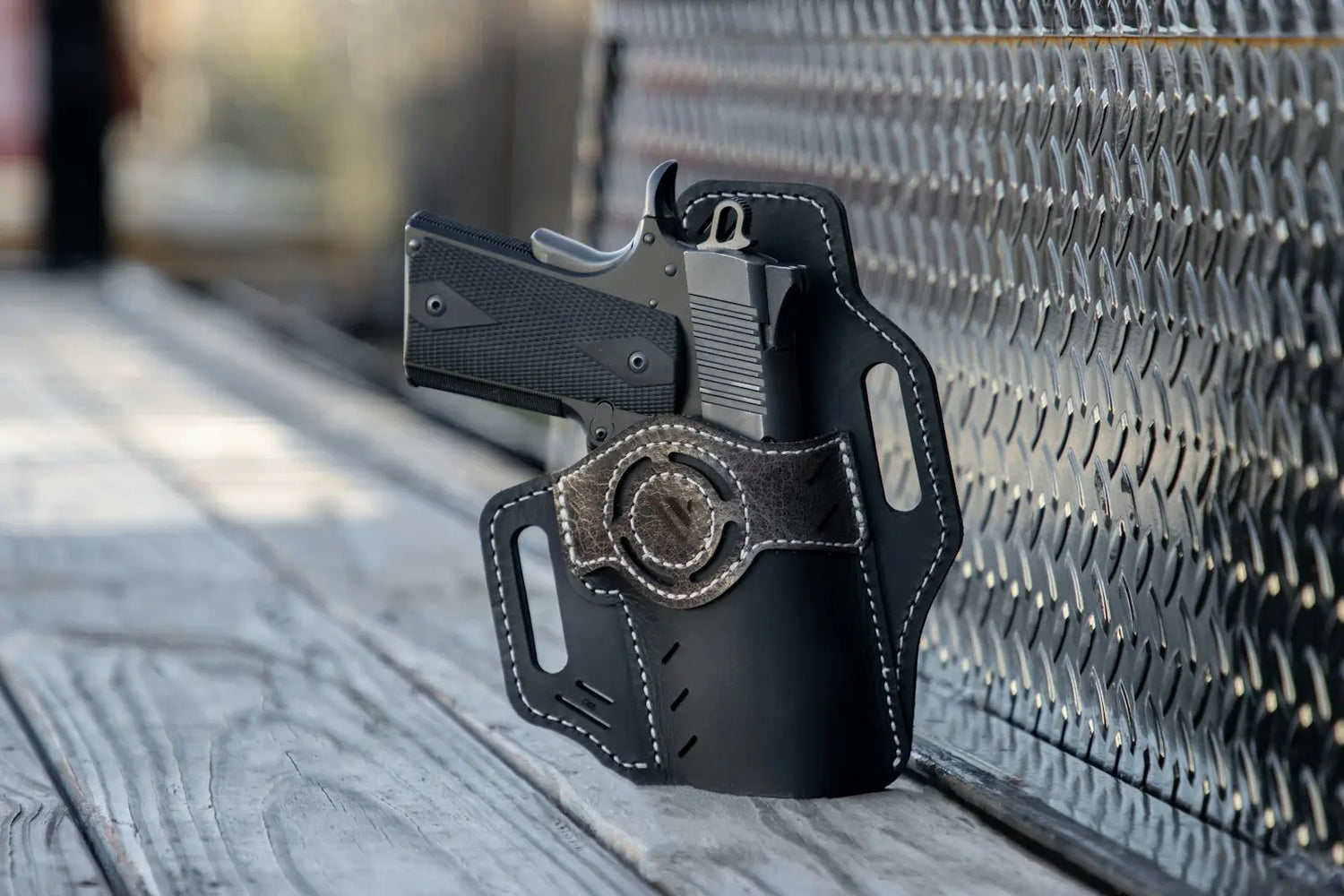 Police duty holster on a cleaning bench before weapon maintenance