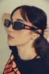 woman in bold black sunglasses