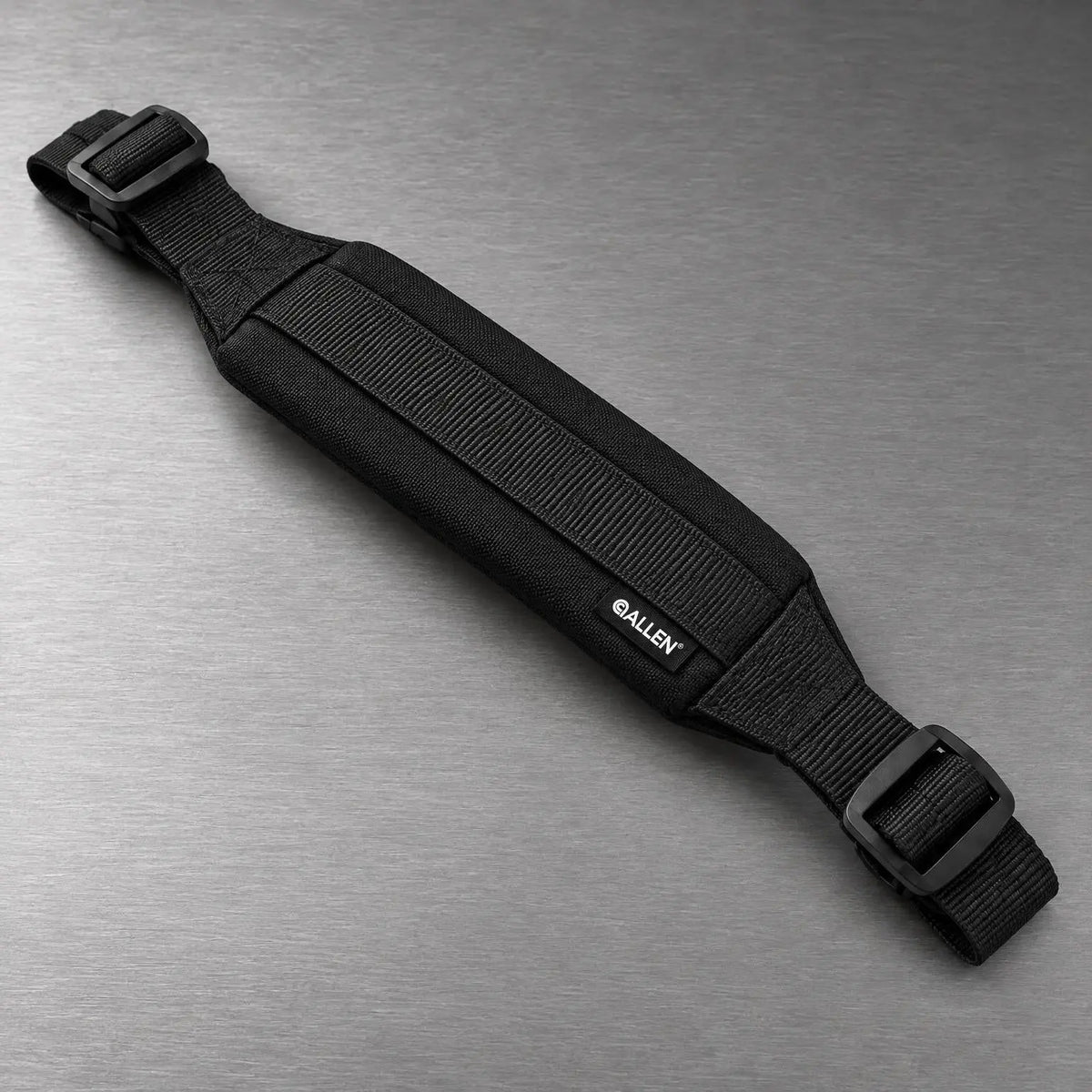 Allen Durango padded rifle sling laid flat showing shoulder pad, center webbing strip and both adjustment buckles
