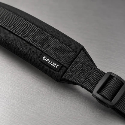Close-up of the Allen Durango sling padded end with woven Allen tag and adjustment buckle