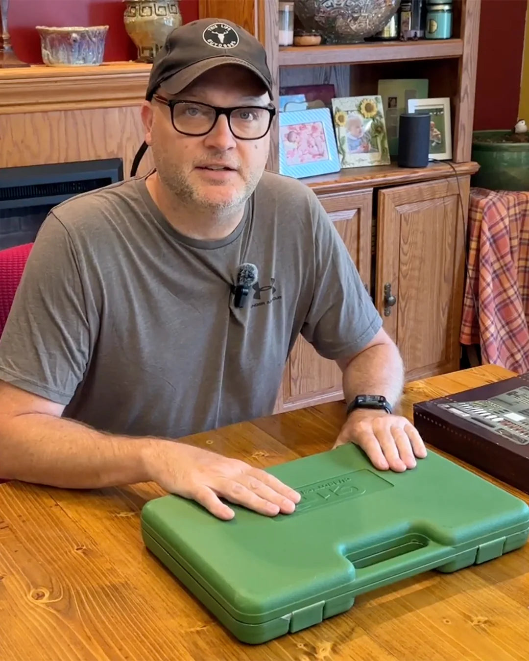 GuardTech Plus customer showing a green gun cleaning kit